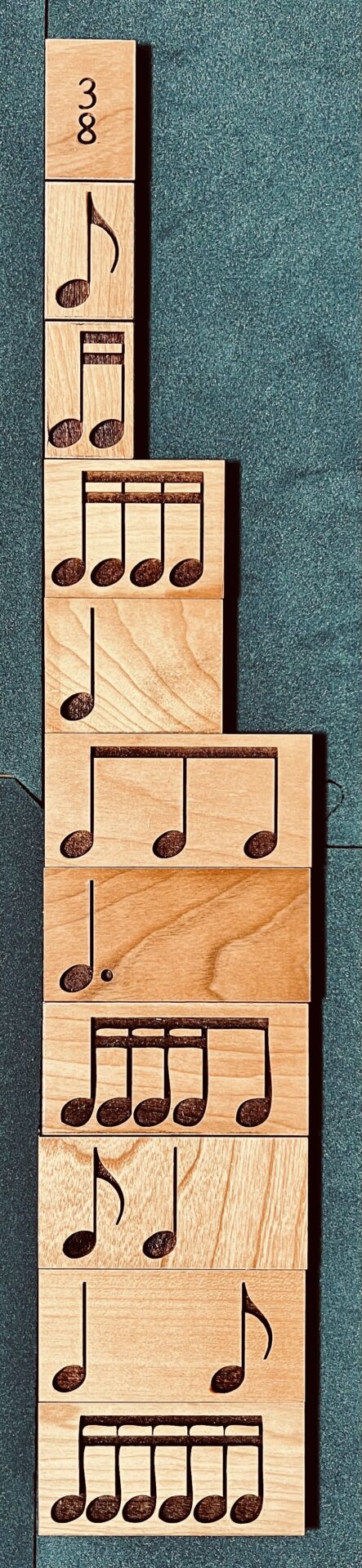 Musical notes on wooden blocks